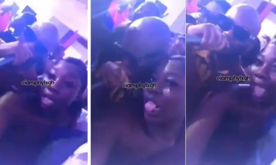King Promise, look at me babe" – Attention-seeking lady shakes backside & rubs body against King Promise to entice him at a club [Video]